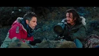 two men with camera on rocky ground — The Secret Life of Walter Mitty