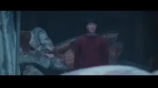 Harry Potter with dragon statue in dark room — Harry Potter and the Philosophers Stone