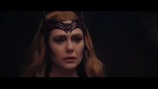 woman's face with black dragon headpiece — Doctor Strange 2