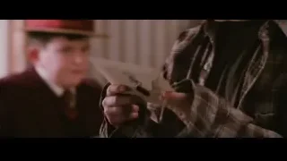two young men in room with painting — Harry Potter and the Philosophers Stone
