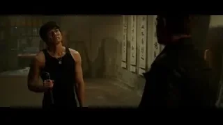 Two men fighting with sword in dark room — Bruce Lee: Birth of The Dragon