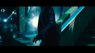 man lying on ground covered in blood — John Wick: Chapter 4