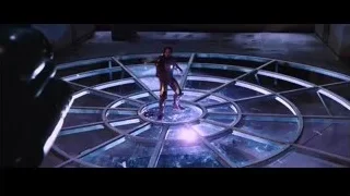 man in futuristic suit with red light — Iron Man