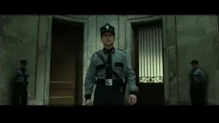 police officers standing by ornate doorway — Harry Potter and the Deathly Hallows 2