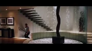 man walking towards glass sculpture — Iron Man
