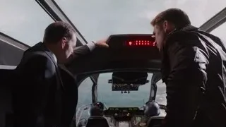 two men in helicopter cockpit explaining controls — The Avengers