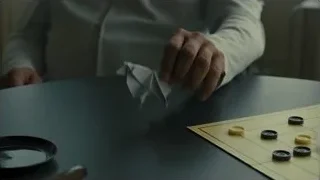 person playing game with origami elephant — Blade Runner 2049