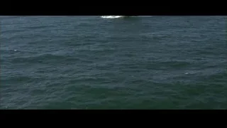 large cargo ship sailing on ocean — Batman