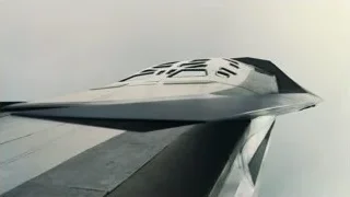fighter jet flying in clear blue sky — Interstellar
