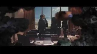 Man holding fish with serious expression — The Wolf Of Wall Street