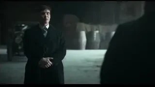 man in dark room with clasped hands — Peaky Blinders