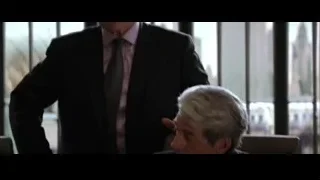 Elderly man in suit walking in hallway — Batman
