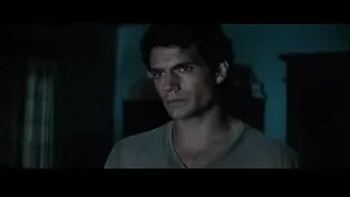 young man in green t-shirt in room — Superman: Man of Steel