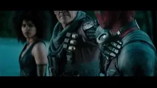 Deadpool in red and black suit with characters — Deadpool 2