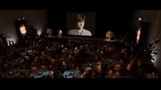 auditorium with people and screen on stage — Jobs