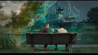 Two men sitting on bench in park — Life of Pi