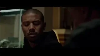 man in dark room deep in thought — Creed