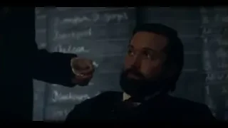 man laughing in front of blackboard — Peaky Blinders