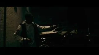 young man in dimly lit room — Creed 3