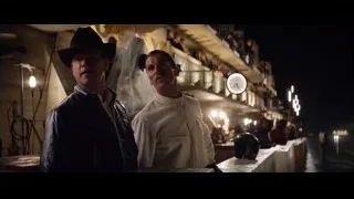 Two men on pier at night — Ford v Ferrari
