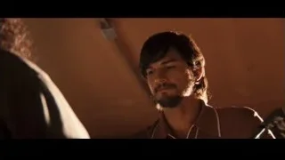 Young man with beard in dimly lit room — Jobs
