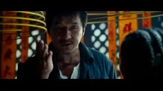 man in blue jacket in dim room — The Karate Kid