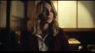 young woman at table looking away — Peaky Blinders