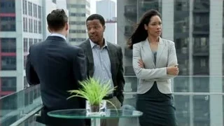 three people conversing on balcony — Suits