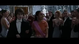 Young couple walking in grand ornate hall — Harry Potter and the Goblet of Fire