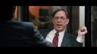 Man in suit explaining in office — Jobs