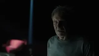 close-up of elderly man in dimly lit room — Blade Runner 2049