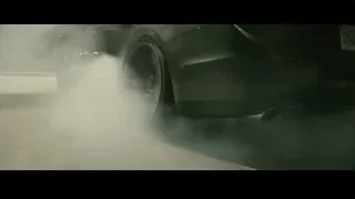 man in driver's seat of car — Furious Seven