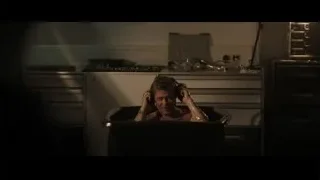 Man in bathtub in kitchen — F1