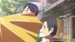 young couple in front of building — Weathering with You