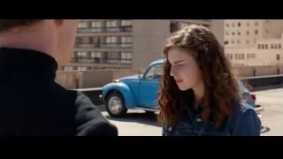 woman by blue car on rooftop — Steve Jobs