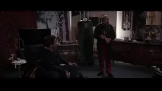 two men talking in a dressing room — Iron Man 3