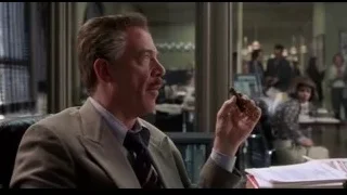 Man in suit smoking cigar at office desk — Spider Man