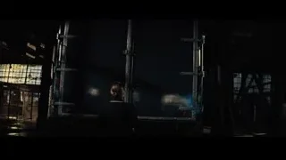 person in dark room with metal structure — Now You See Me