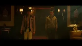 Two men gesturing in dimly lit room — Bruce Lee: Birth of The Dragon