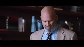 Man in beige suit holding whiskey glass — Iron Man