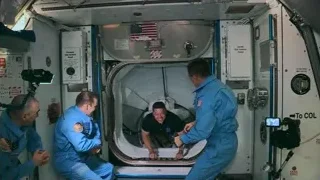astronauts removing person on stretcher in space station — Elon Musk: Return to Space