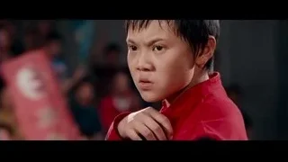 close-up of young boy with hand on chin — The Karate Kid