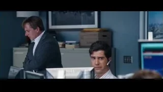 men in suits in office with monitors — The Big Short