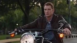 Young man riding motorcycle on street — The Avengers