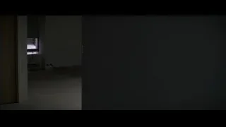 four blindfolded men in empty concrete room — Batman: The Dark Knight