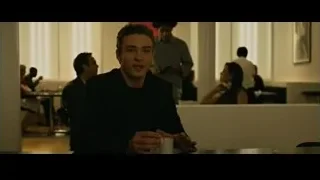 young man sitting at restaurant table — The Social Network