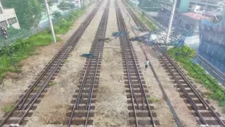 Railway track in urban construction area — Weathering with You