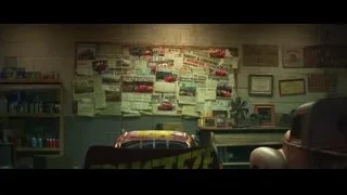 Room with car posters and two old cars — Cars 3
