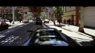Busy city street with cars and pedestrians — Batman: The Dark Knight