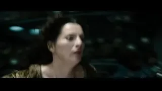 woman in green dress in dimly lit room — Superman: Man of Steel